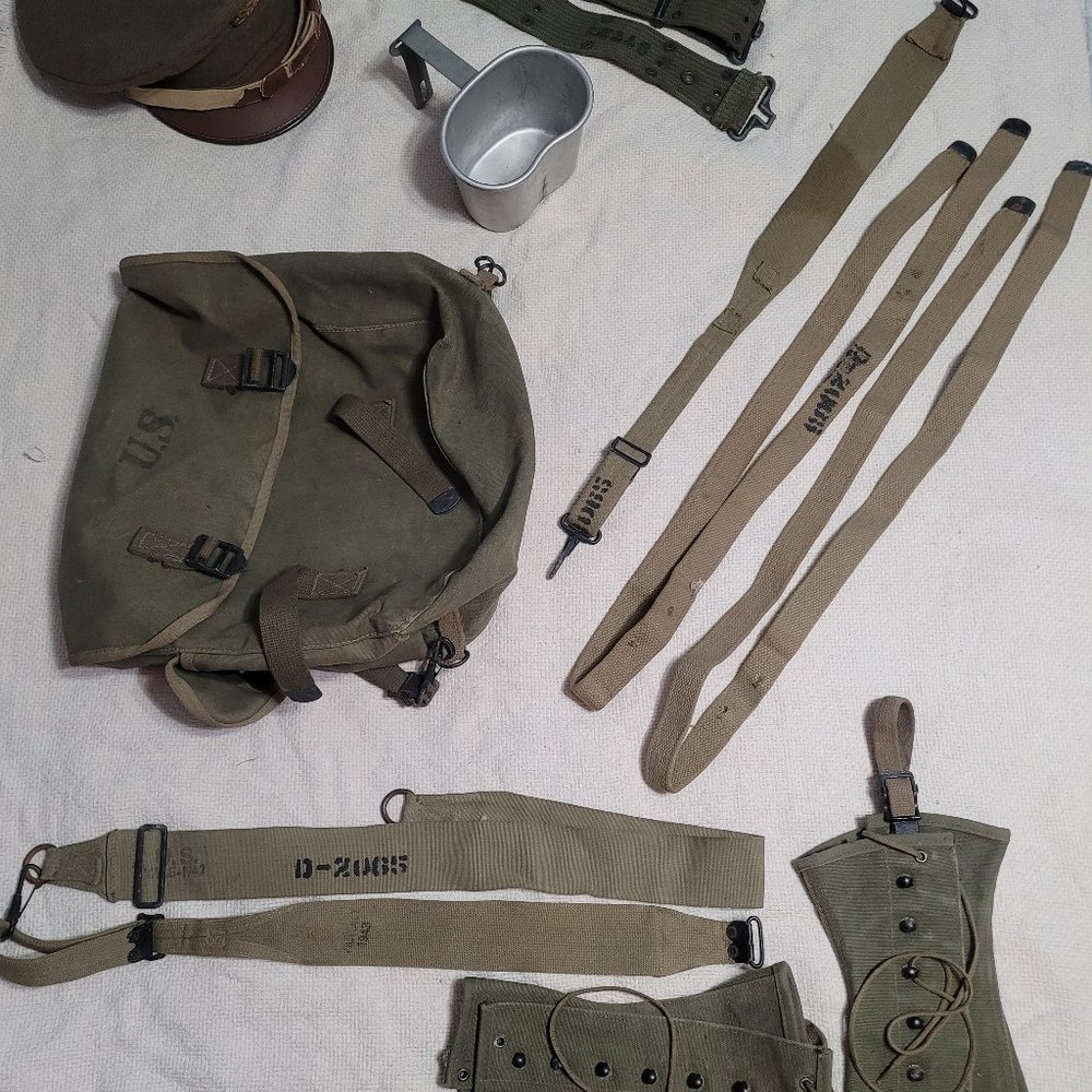 WWll Apparel (backpack, dress cap, straps, first aid kit, leggings, canteen)